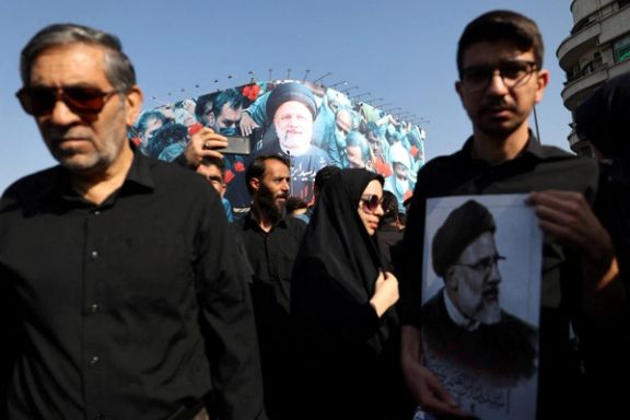 Mourners attend a funeral for victims of the helicopter crash that killed Iran's President Ebrahim Raisi, Foreign Minister Hossein Amirabdollahian and others, in Tehran, Iran, May 22, 2024.