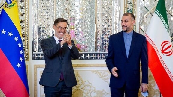 Venezuelan foreign minister Felix Plasencia (L) and Iran's Amir-Abollahian. October 18,2021