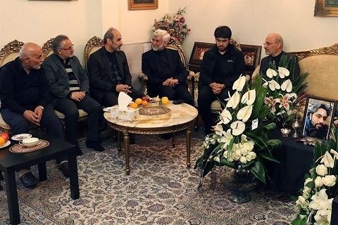 Iranian hardliner politician and diplomat Saeed Jalili (center) during a visit to Peyman Jebelli’s brother (right) who lost his son in IRGC’s shooting down of the Ukrainian flight PS752 (file photo)