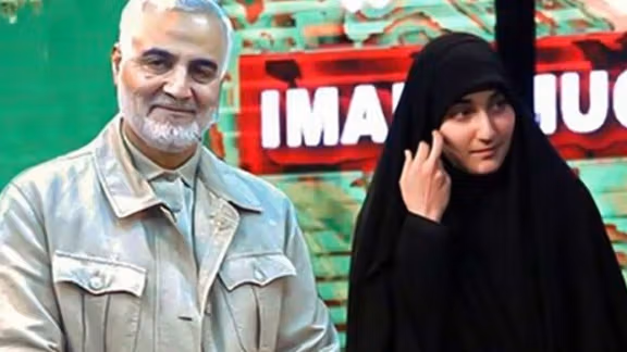 Qasem Soleimani and his daughter Zeinab in an undated photo.