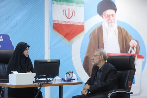 Ali Larijani (right) registers as a candidate for the presidential election at the Interior Ministry, in Tehran, Iran May 31, 2024