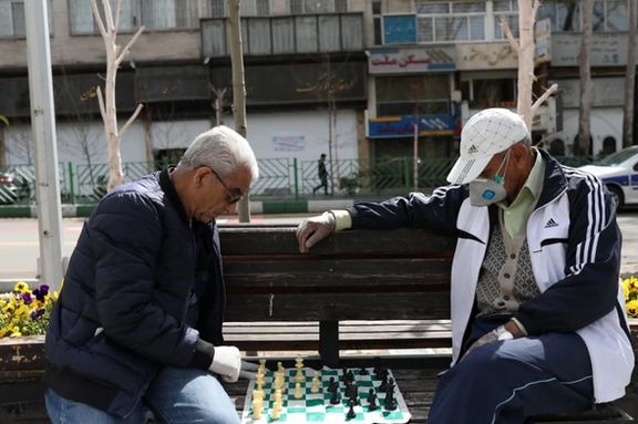 Men playing chess in Tehran