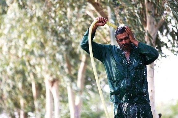 A worker cooling himself down in hot weather