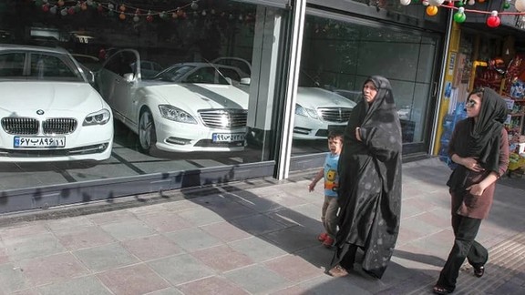 Luxury cars on display in Iran while ordinary workers earn around $200 a month.
