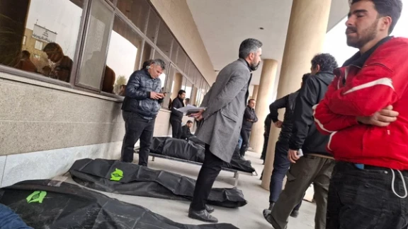 People gather at the Kahrizak facility south of Tehran to collect the bodies of loved ones killed during the protests. (January 2026)