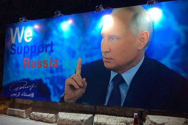 Iraq Removes Putin Billboard Reportedly Set Up By Iran-Backed Militias