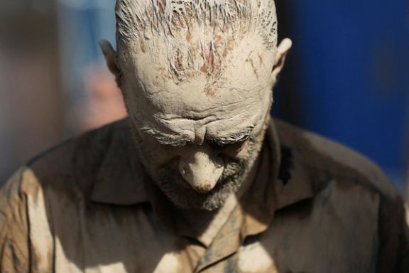 An Iranian Shiite Muslim mourns after covering himself with mud during a ceremony to mark Ashura, the holiest day on the Shiite Muslim calendar, in Tehran, Iran July 28, 2023.