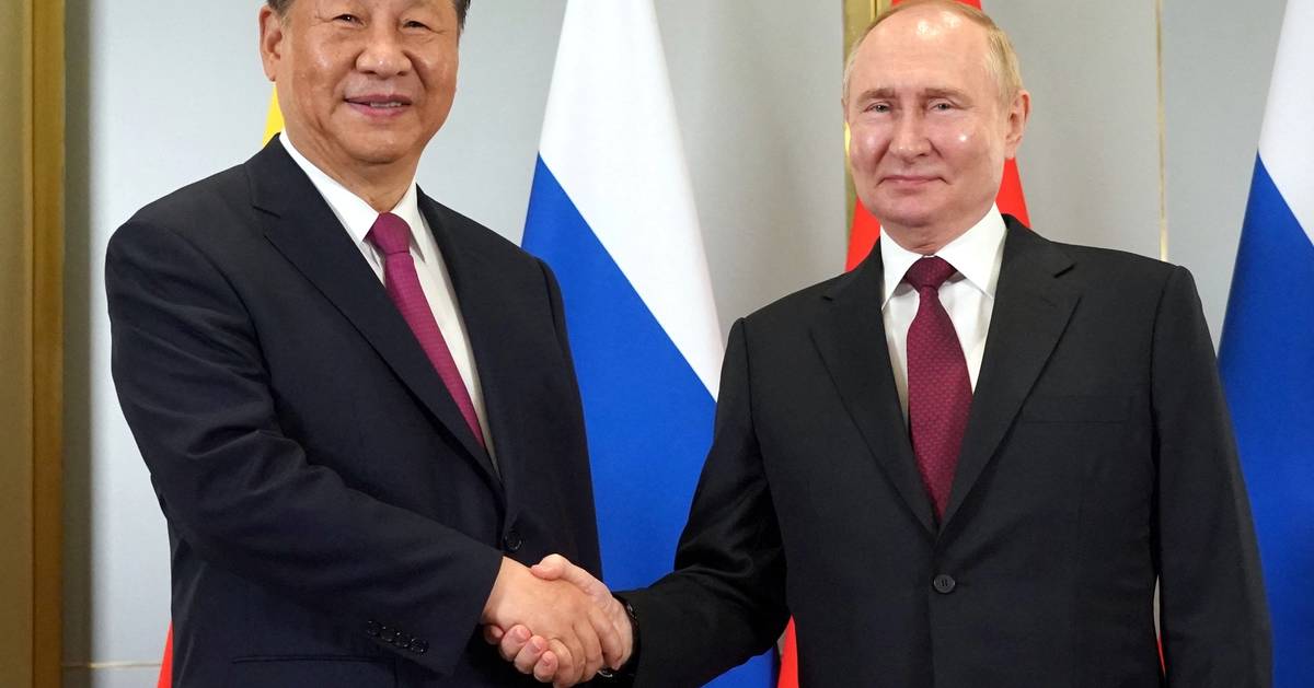 Iran To Attend China Parade As Putin And Kim Join Xi In Show Of iran-to-attend-china-parade-as-putin-and-kim-join-xi-in-show-of