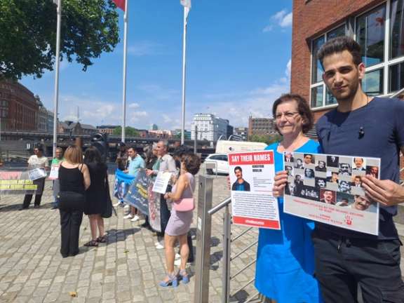 German Iranian community members protesting outside the office of Körber Foundation in Hamburg. June 27, 2024