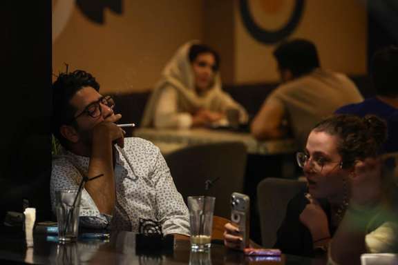 Young people hang out in a cafe in central Tehran, May 10, 2026