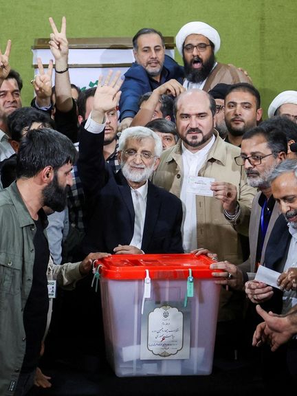 Saeed Jalili waves at the crowd during the run-off presidential election between him and Masoud Pezeshkian, in Tehran, Iran, July 5, 2024