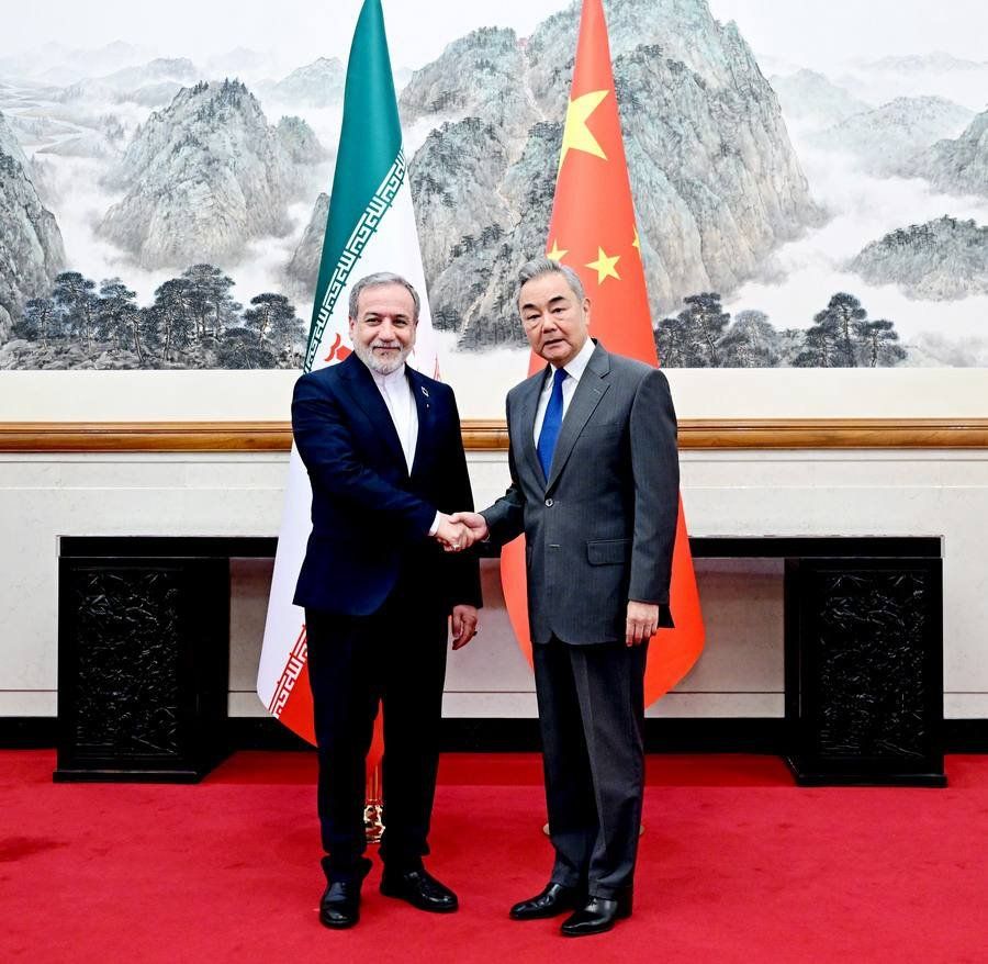 Iranian Foreign Minister Abbas Araghchi and Chinese Foreign Minister Wang Yi.