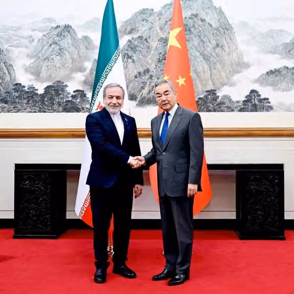 Iranian Foreign Minister Abbas Araghchi and Chinese Foreign Minister Wang Yi.