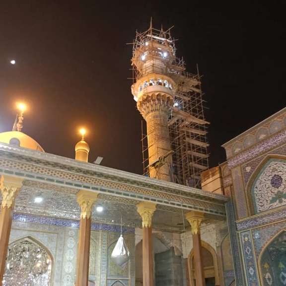 The project for gilding a minaret of the shrine of Shiite Imams Musa al-Kadhim and his grandson Muhammad al-Jawad is underway in a suburb of Baghdad, Iraq in April 2022.