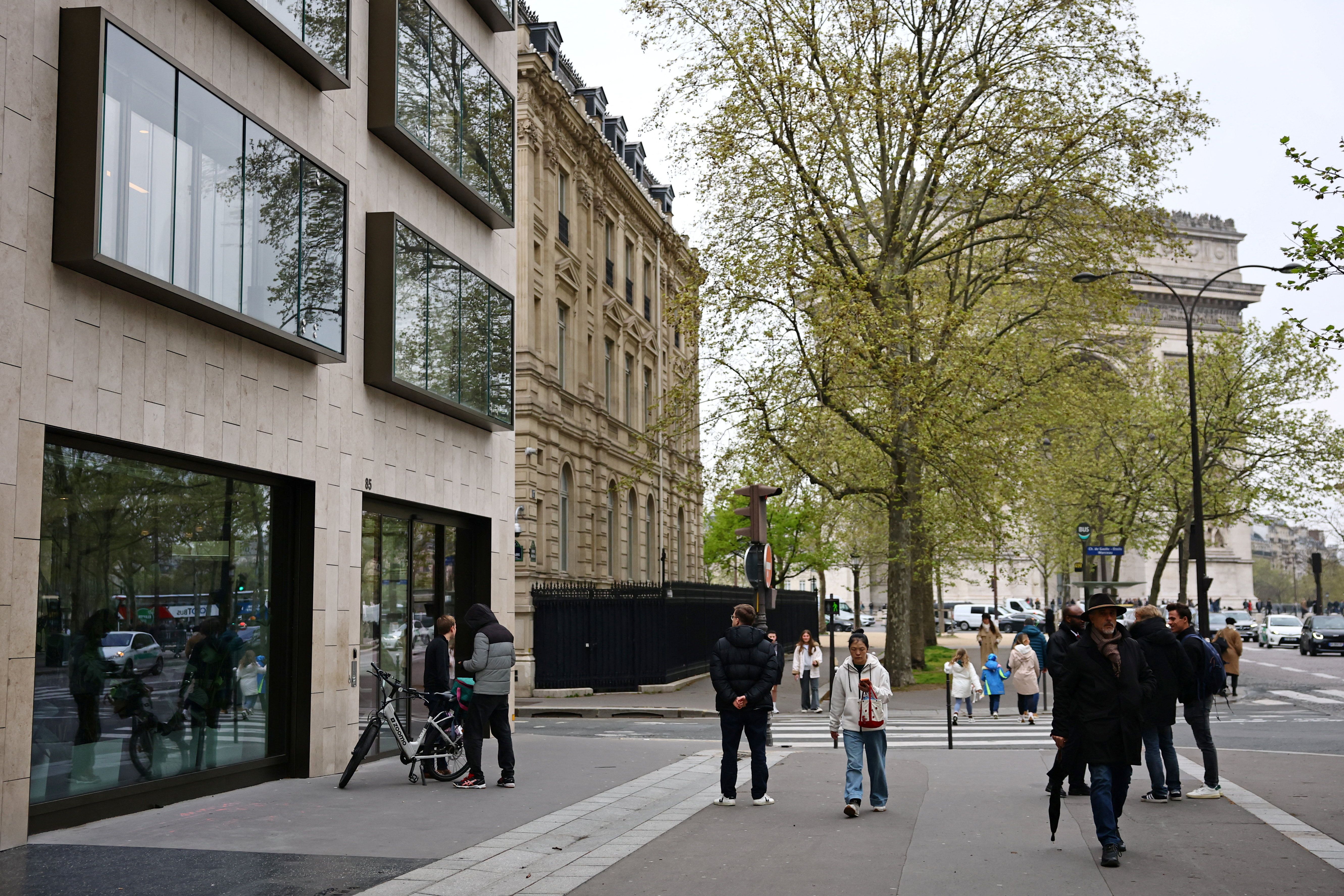 People walk past the headquarters of US investment bank Goldman Sachs in Paris, France, April 2, 2026. 