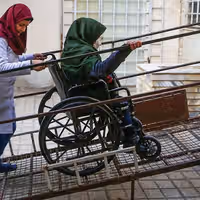 Iran cuts living allowances for many people with disabilities