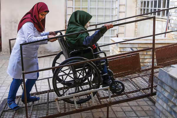 Iran cuts living allowances for many people with disabilities