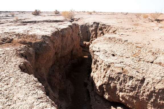 A huge crack in land near the Iranian city of Esfahan. Undated
