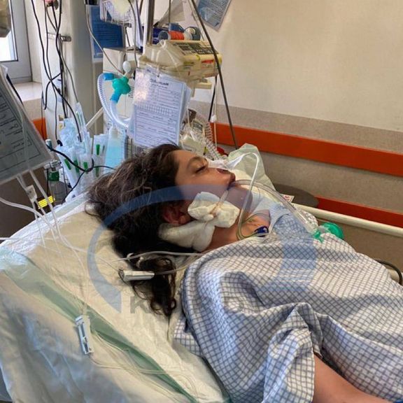 Mahsa Amini in her hospital bed, while bleeding from her right ear shows head trauma