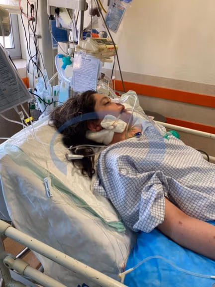 Mahsa Amini in the hospital in coma before she passed away on September 16, 2022