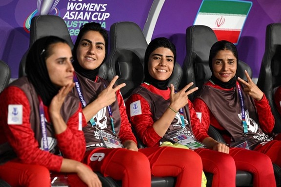 Iran players Zahra Ghanbari (left), Mona Hamoudi and Atefeh Ramezanizadeh react from the bench during the AFC Women’s Asian Cup Group A match between Iran and the Philippines at Gold Coast Stadium in Australia on March 8, 2026.