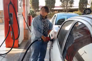 Iranians hit back at VP's case for pricier gasoline as dollar passes 2.1m rials