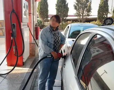 Iranians hit back at VP's case for pricier gasoline as dollar passes 2.1m rials