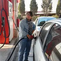 Iranians hit back at VP's case for pricier gasoline as dollar passes 2.1m rials