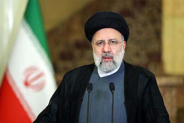 Raisi Says Iran 'Will Not Leave The Negotiating Table' Until Sanctions Lifted