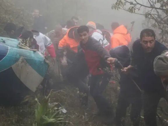 Rescue team members works following at the scene. of a crash of the helicopter carrying Iran's President Ebrahim Raisi, in East Azarbaijan Province, Iran, May 20.