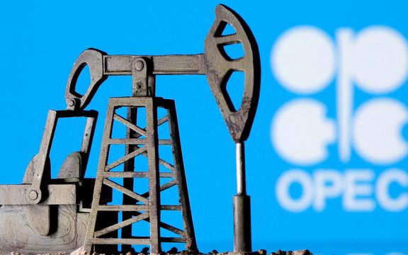 A 3D-printed oil pump jack is seen in front of the OPEC logo in this illustration picture