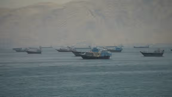 Vessels anchored at the Strait of Hormuz, as seen from Musandam, Oman, on May 25, 2026