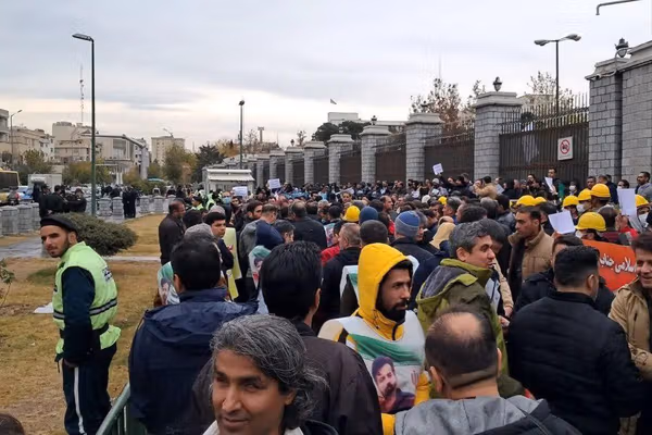 Iran welfare staff, contract workers protest outside parliament
