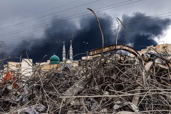 A building reduced to rubble after an airstrike by US or Israeli forces, Tehran, Iran, March 8, 2026