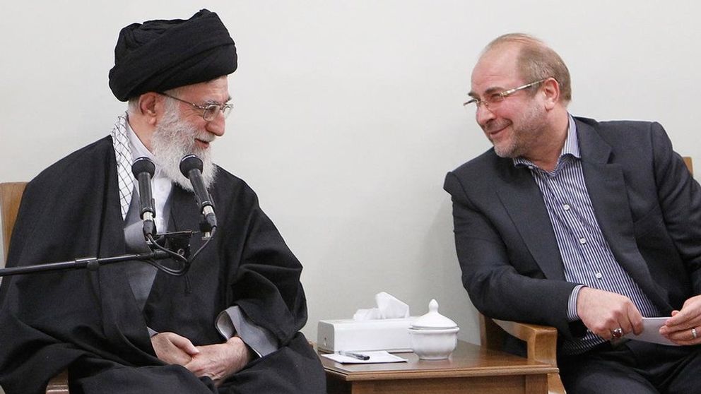 Iran’s ruler Ali Khamenei (left) and Parliament Speaker Mohammad Bagher Ghalibaf 