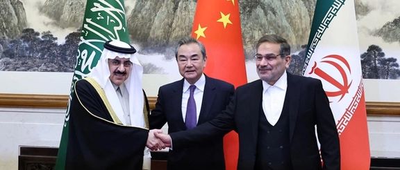 Wang Yi, China’s chief diplomat, Ali Shamkhani (R), Iran’s national security chief, and Saudi representative Musaad bin Mohammed Al Aiban in Beijing, March 10, 2023