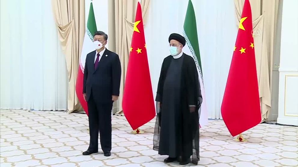 Chinese President Xi Jinping meets his Iranian counterpart Ebrahim Raisi in Samarkand, Uzbekistan, in September 2022.   