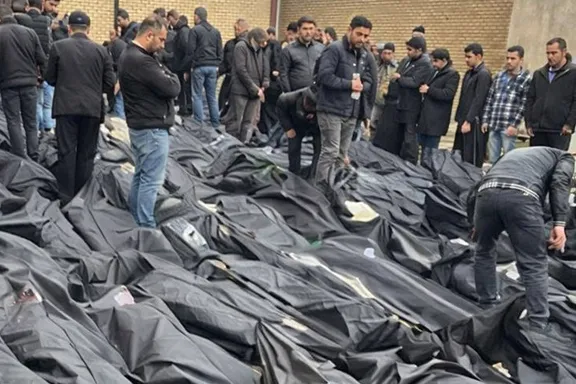 People search for loved ones among rows of bodybags in Tehran, Iran, January 2026