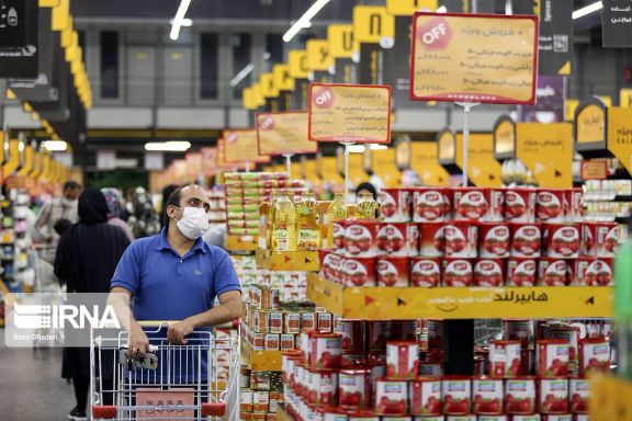 An Iranian man shopping in a supermarket