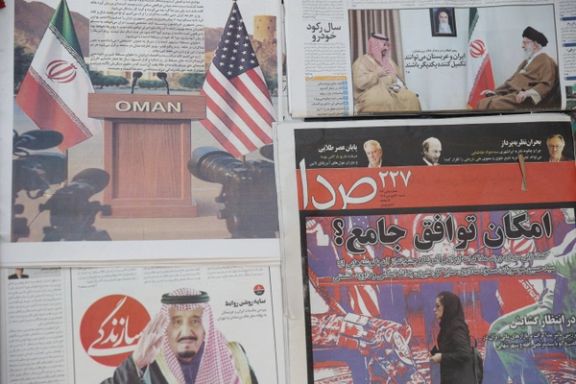 An Iranian newspaper with a cover photo of Iran and US flags is seen in Tehran, Iran, April 19, 2025.