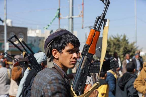 A newly recruited Houthi fighter looks on during a ceremony at the end of his training in Sanaa, Yemen January 11, 2024.