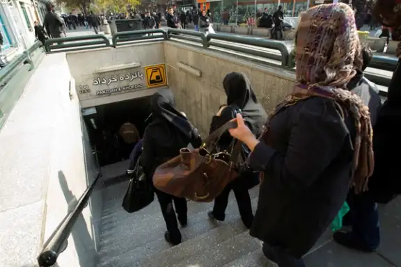 Passengers entering a metro station at the bazaar in Tehran