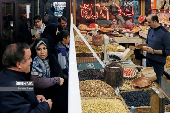 Iranians shopping in a bazaar in Tehran