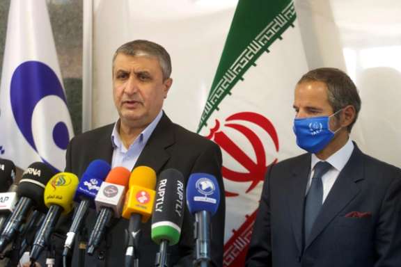 The head of Iran's Atomic Energy Organization, Mohammad Eslami with the director of the IEA Rafael Grossi in Tehran in 2022