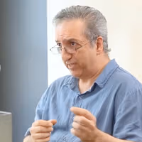 Detained economist had linked rise of Tehran ultra-hardliners to Khamenei