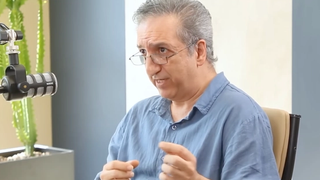 Detained economist had linked rise of Tehran ultra-hardliners to Khamenei