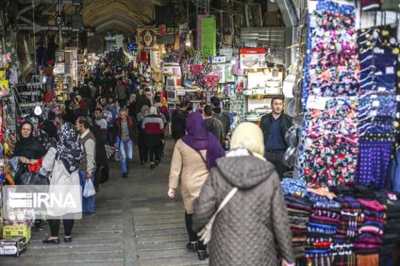 Iranians walking through Tehran Bazaar