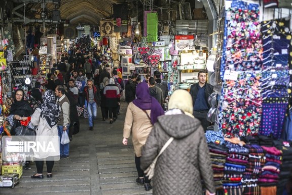 Iranians walking through Tehran Bazaar