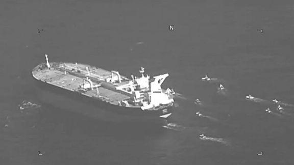 Fast-attack crafts from IRGC Navy swarming oil tanker Niovi as it transits the Strait of Hormuz, May 3, 2023