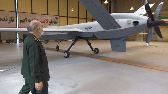 The commander of IRGC, Gen Hossein Salami inspecting a drone.